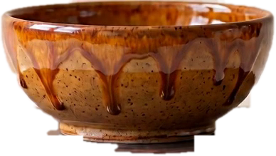 The finished Kosava bowl with amber-orange glaze